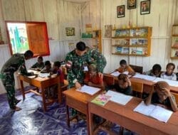 Ciptakan Generasi Unggul, Satgas Yonif 125/SMB Ajarkan Calistung di Rumah Baca Si’mbisa