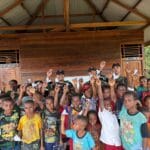 Implementasi Program Calistung oleh TNI Untuk Mendukung Pembangunan SDM di Kampung Kombut